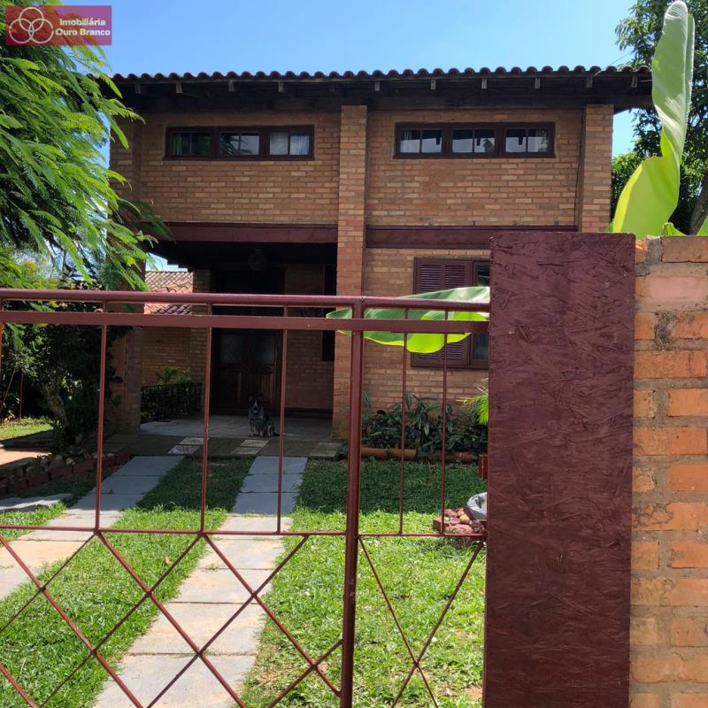 Casa à venda com 5 quartos, 220m² - Foto 1